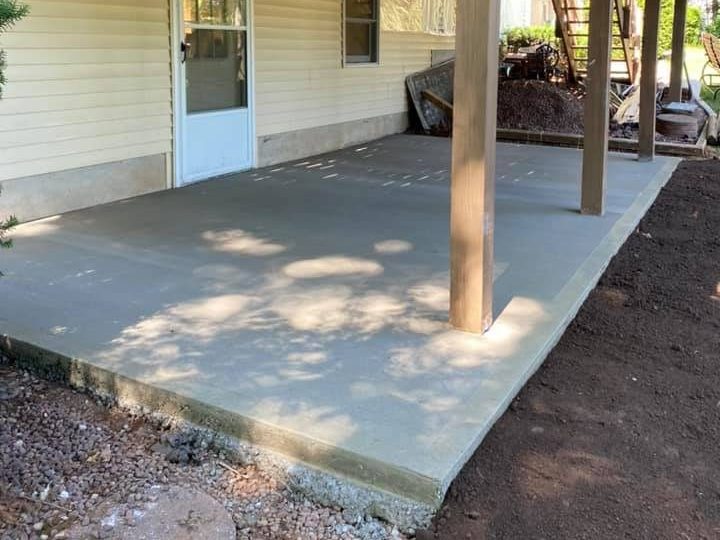a fresh poured porch of a house